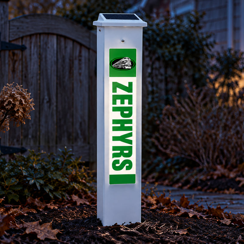 Benton Zephyrs Solar Glow Post lit up at dusk.