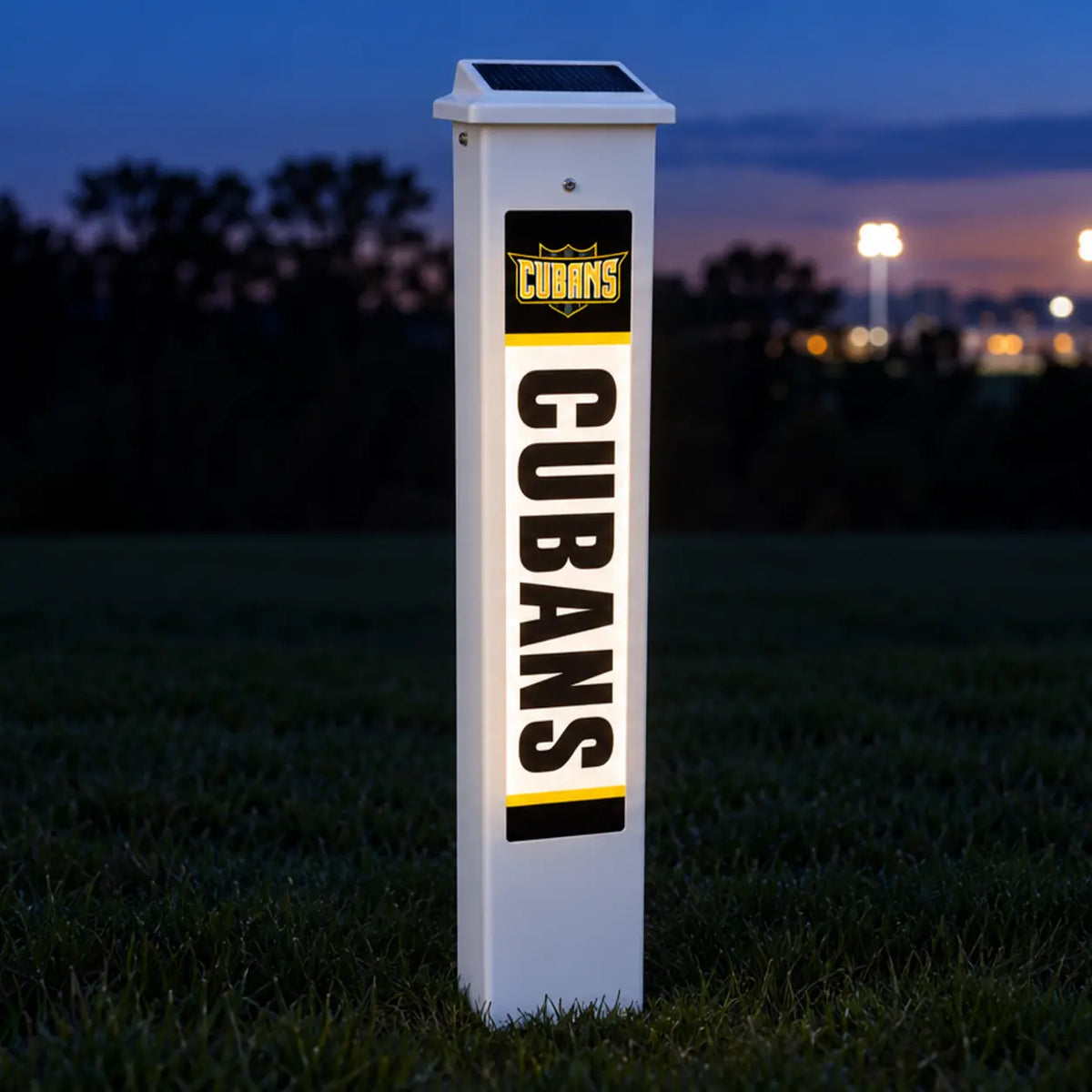 Cuba City Cubans Solar Glow Post lit up at dusk.