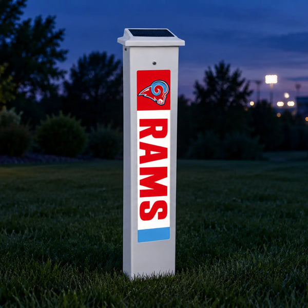 Dubuque Senior Rams Solar Glow Post lit up at dusk.